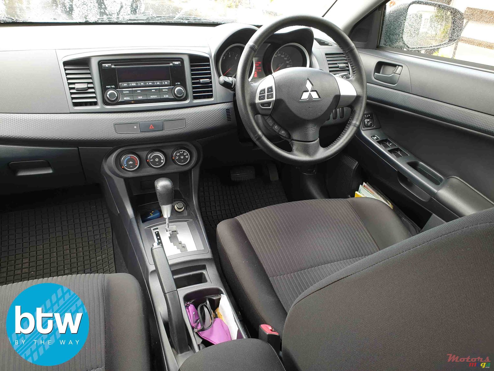 2015' Mitsubishi Lancer Ex photo #4