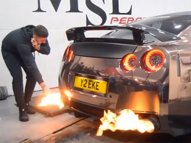 Watch This Idiot Light A Cigarette on a GT-R's Exhaust Flame