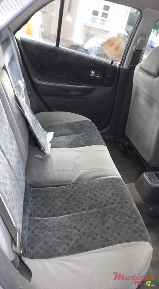 2000' Mazda 323 photo #7