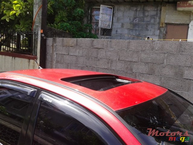 2006' Mitsubishi Lancer X glx photo #3