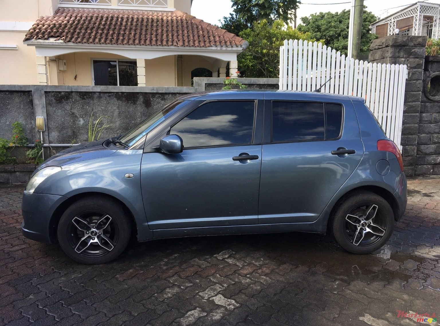 2006' Suzuki Swift photo #1