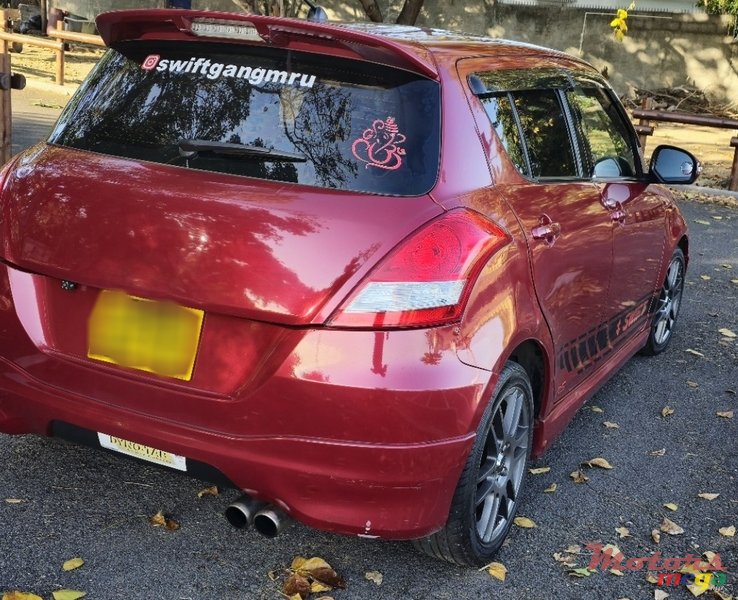 2014' Suzuki SA310 Swift photo #1