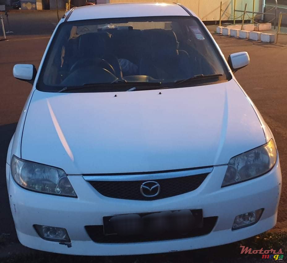 2002' Mazda 323 1324 cc photo #1