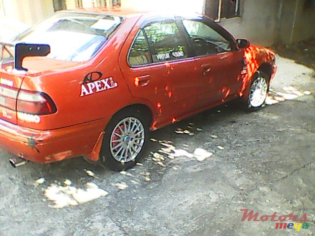 1998' Nissan Sunny saloon photo #1