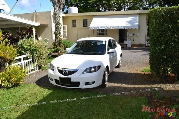 2007' Mazda 3 photo #1