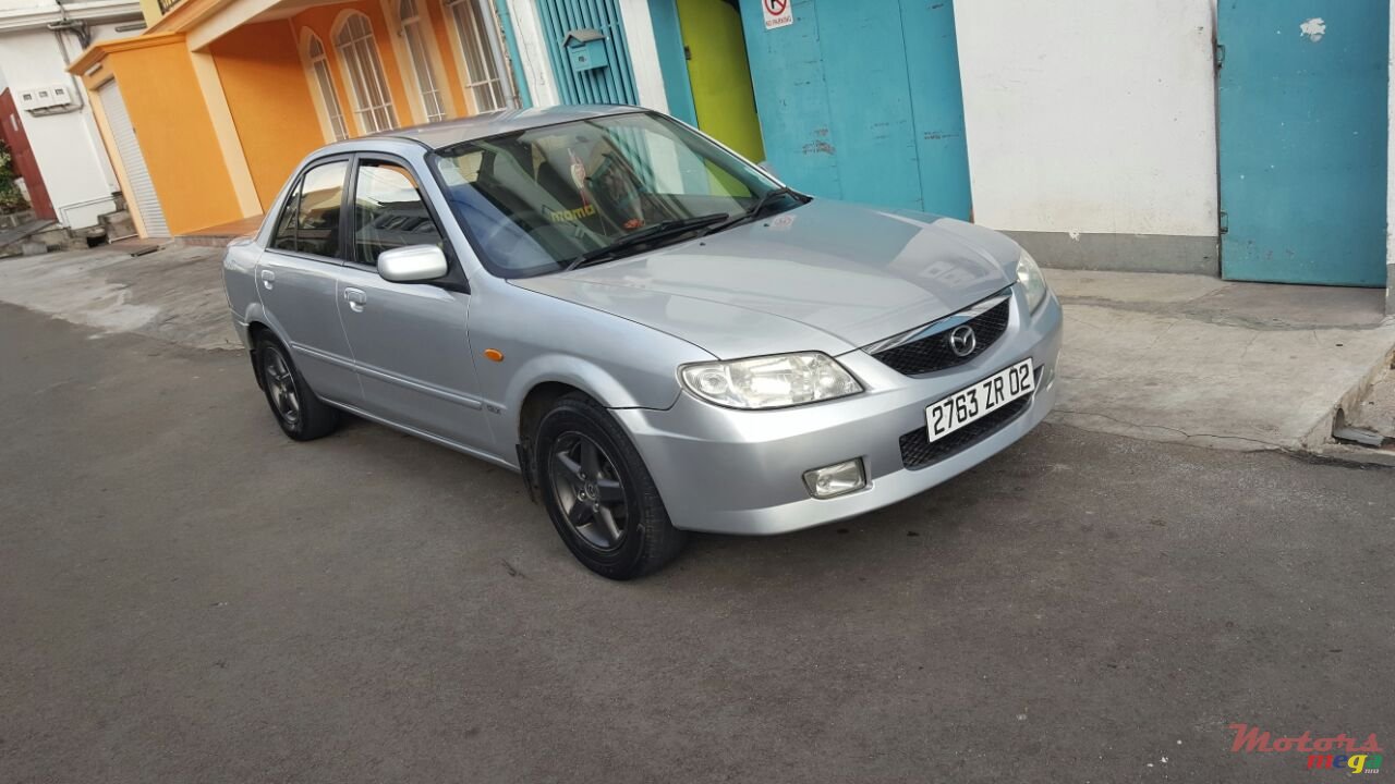 2002' Mazda Familia jant cosmic photo #4