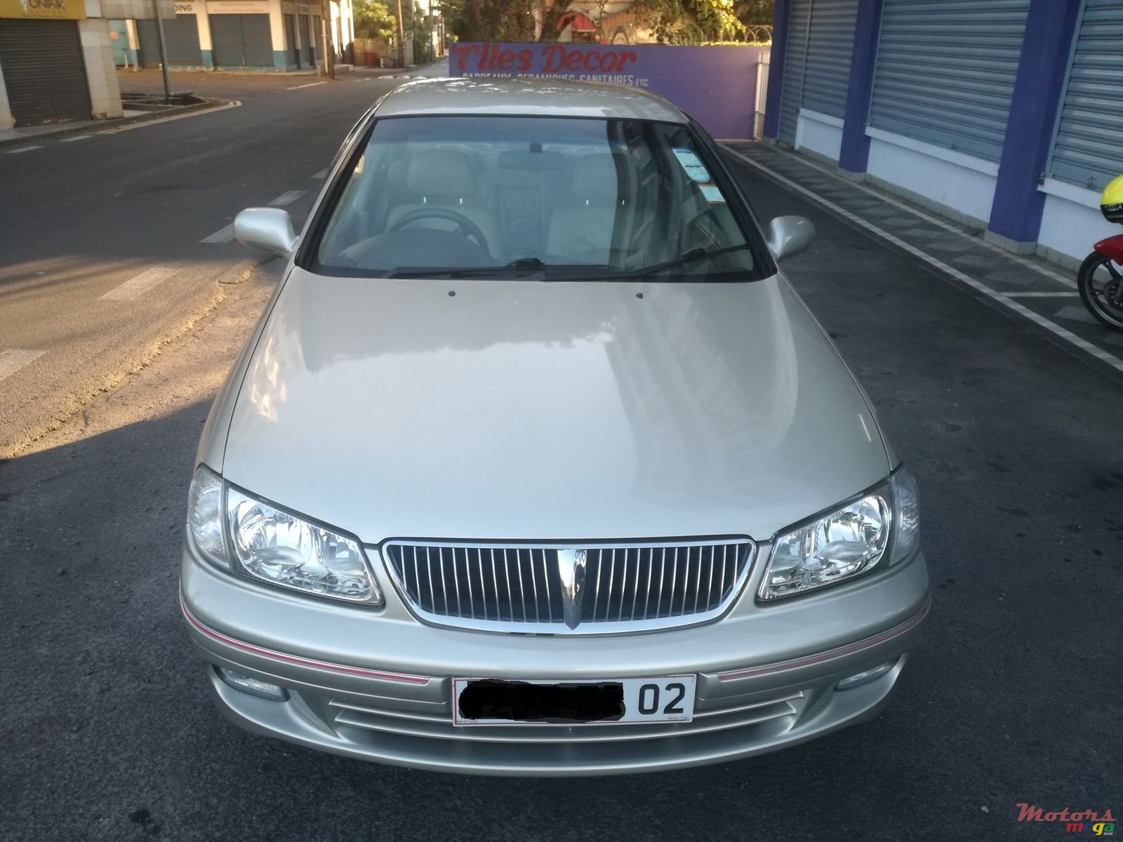 2002' Nissan Sunny photo #1