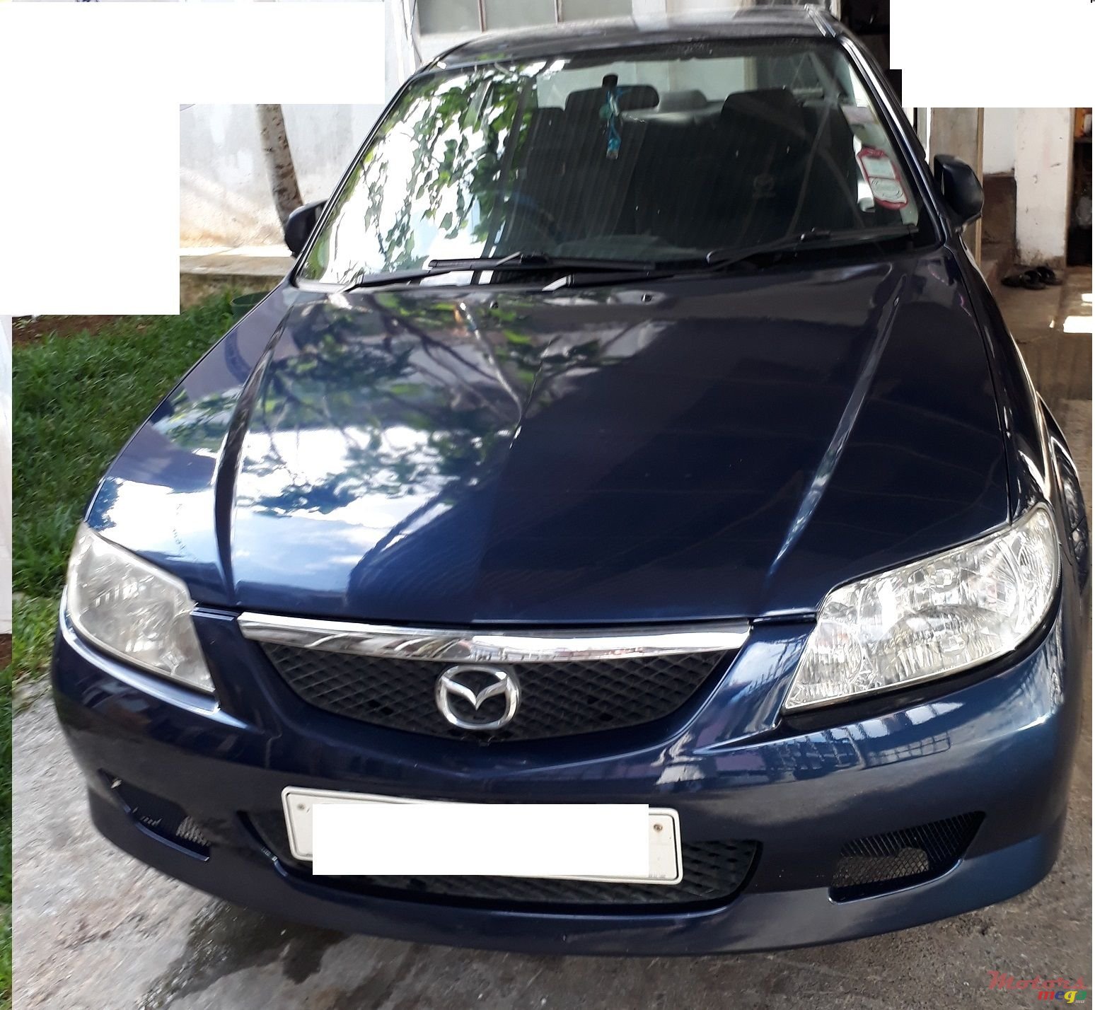 2001' Mazda 323 photo #1