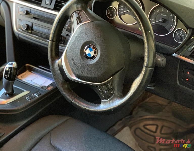 2014' BMW 316 photo #3