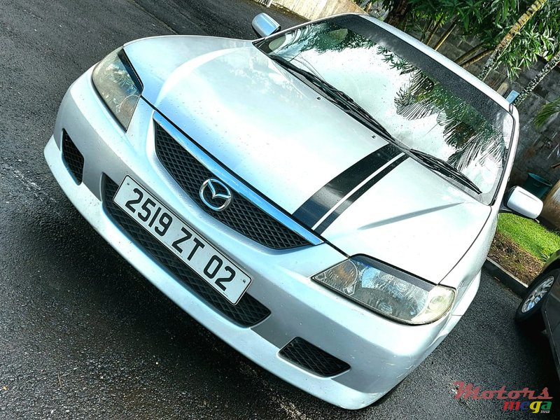 2002' Mazda 323 photo #5