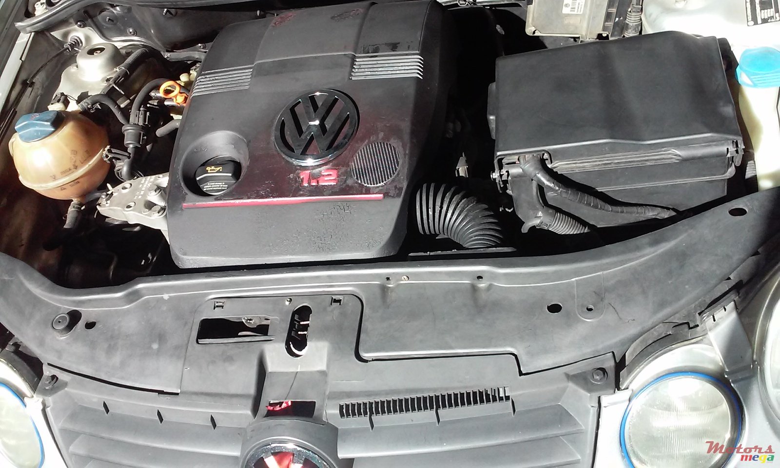 2004' Volkswagen Polo photo #4