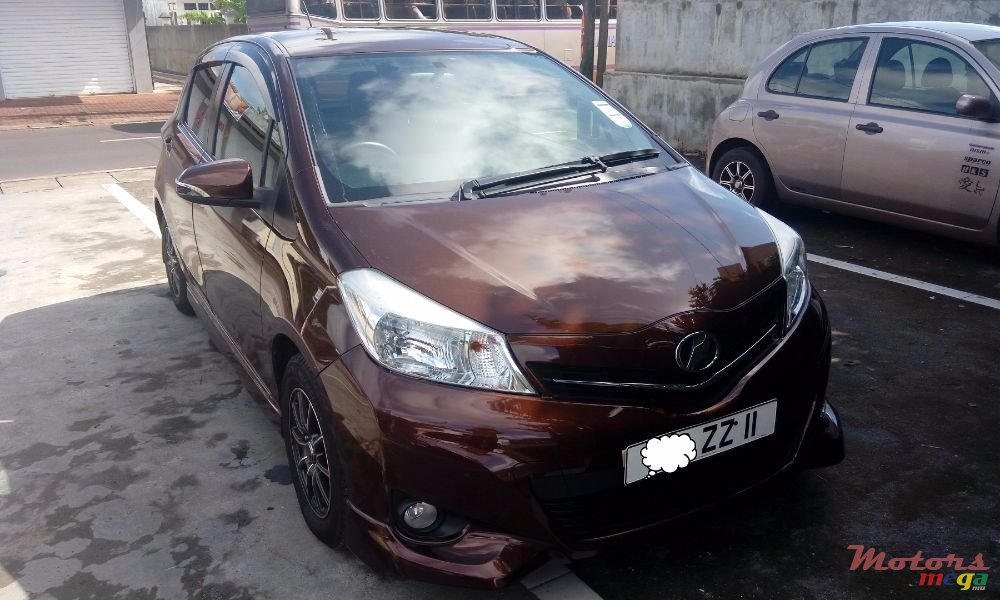 2011' Toyota Vitz photo #1