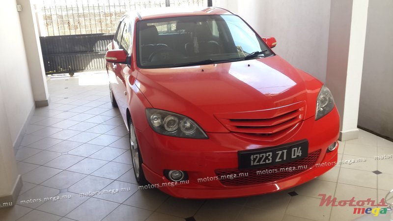 2004' Mazda 3 photo #1