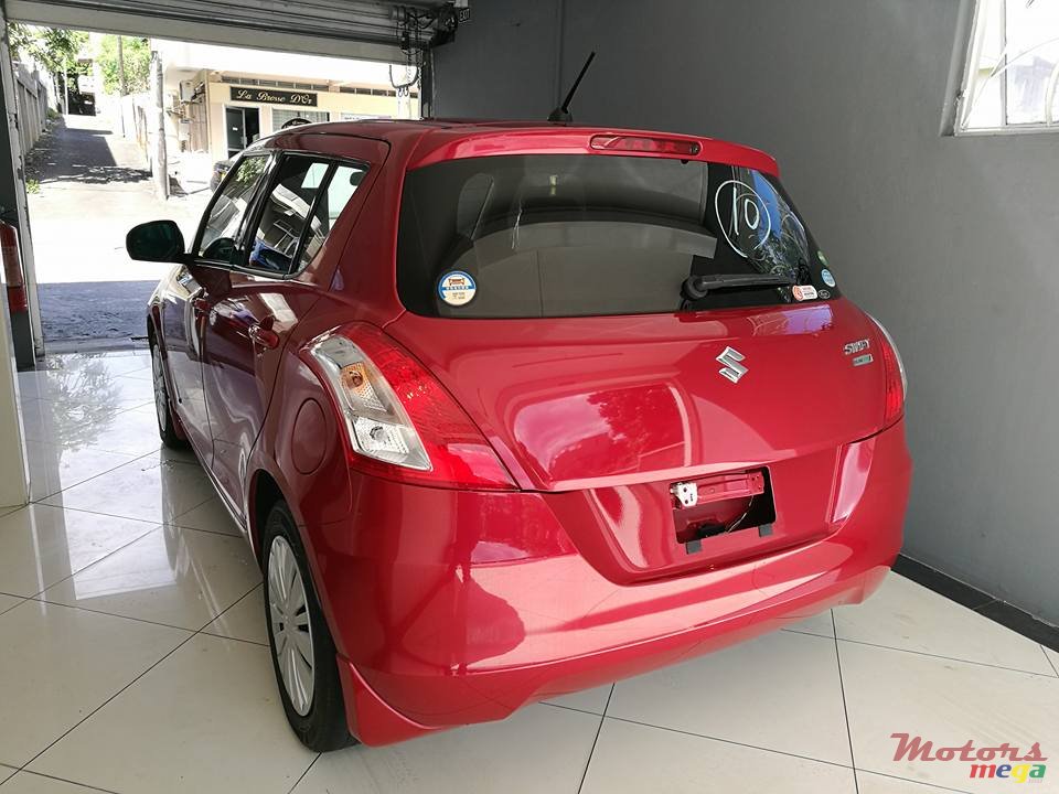 2014' Suzuki SA310 Swift photo #4
