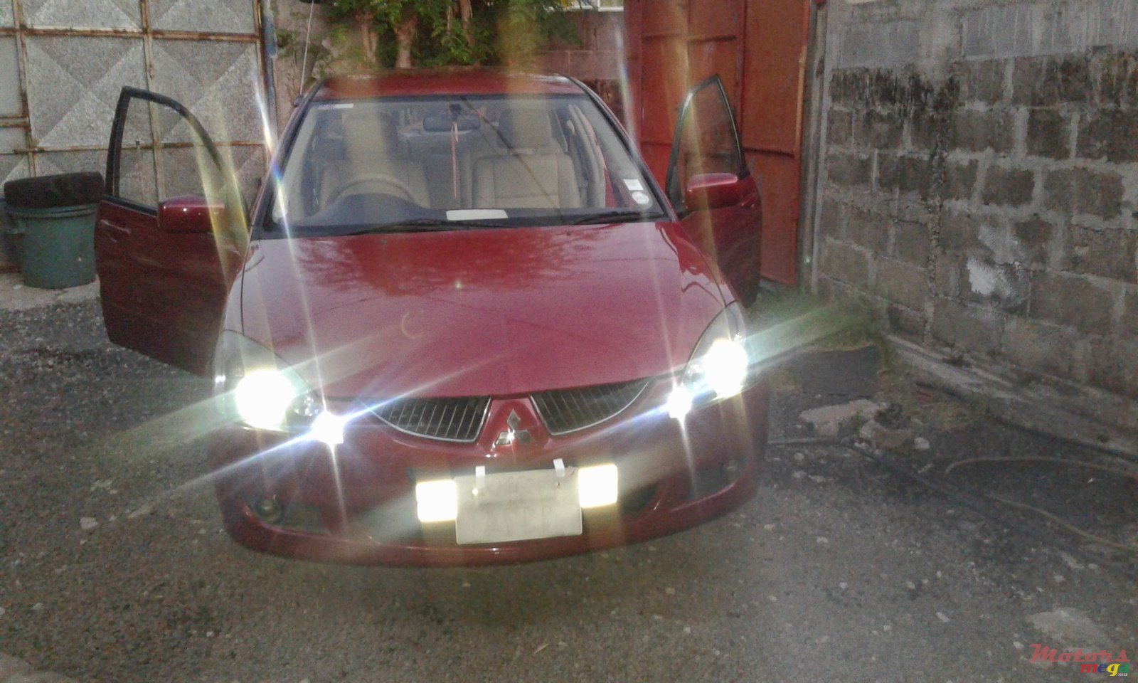 2004' Mitsubishi Lancer Glx photo #1