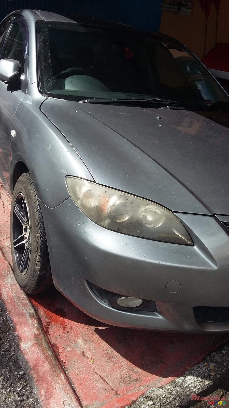 2004' Mazda Axela photo #1