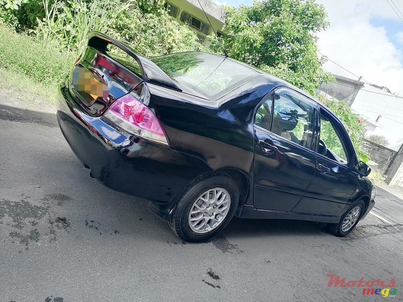 2008' Mitsubishi Lancer photo #3