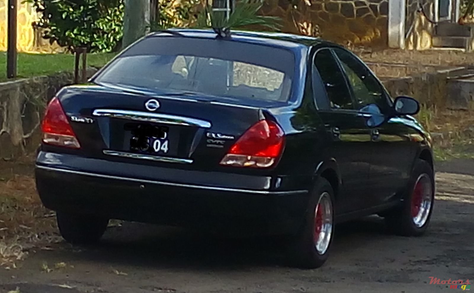 2004' Nissan Sunny photo #2