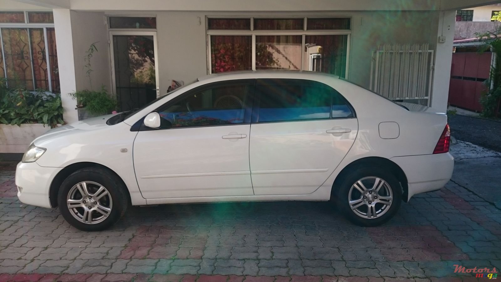 2006' Toyota Corolla NZE grade G photo #2