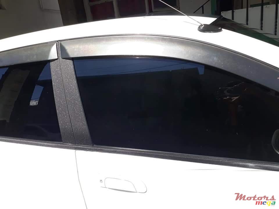 2004' Honda Fit Tinted windows, alloy tires photo #5