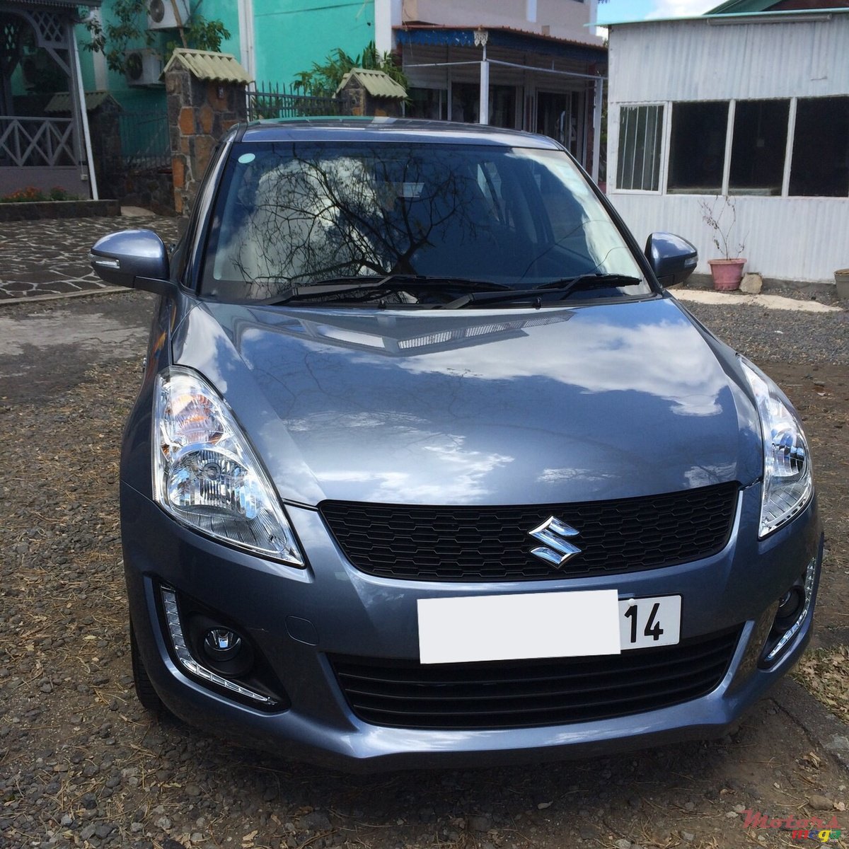 2014' Suzuki Swift photo #1