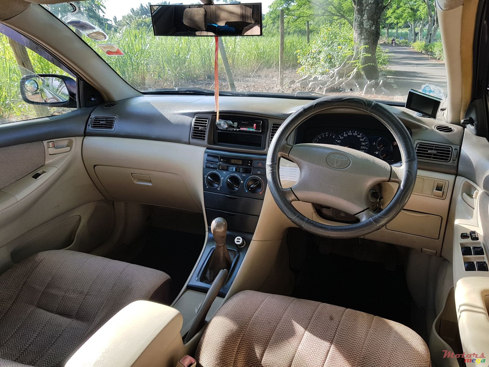 2004' Toyota Corolla NZE photo #3