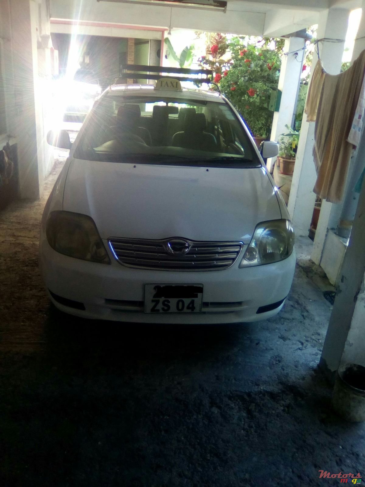 2004' Toyota Corolla photo #1