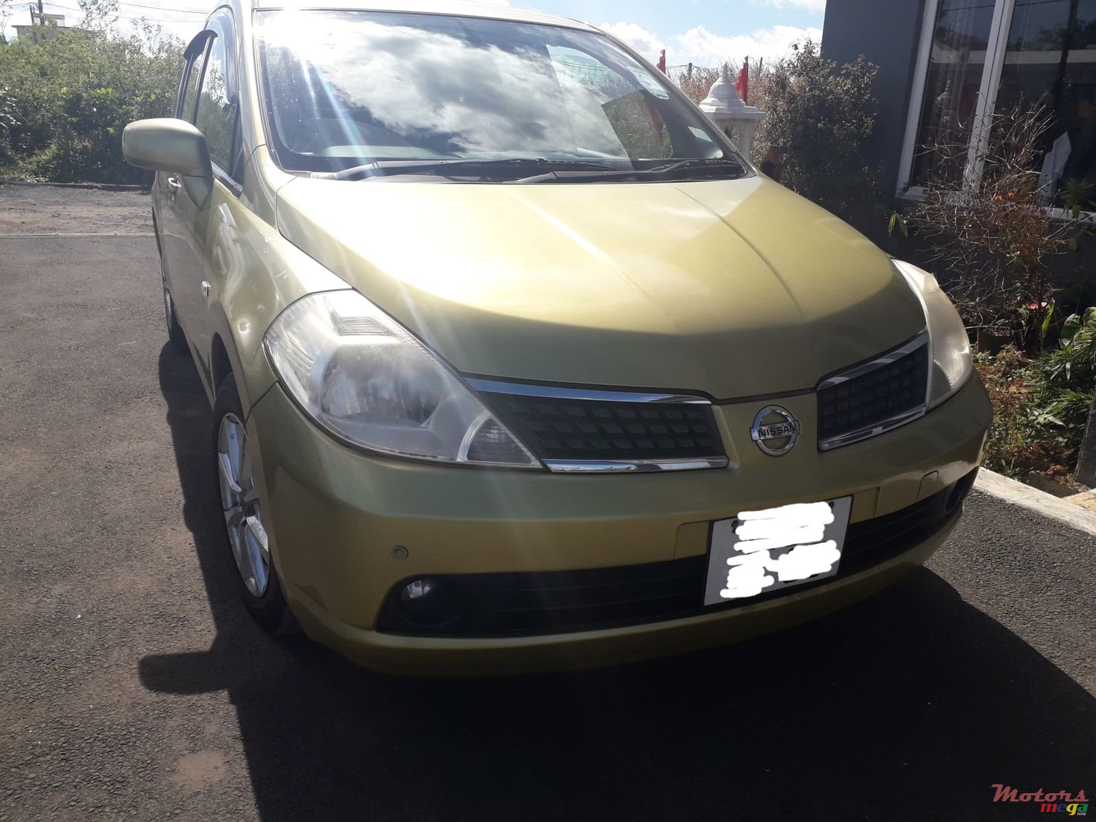 2007' Nissan Tiida H/Back photo #1