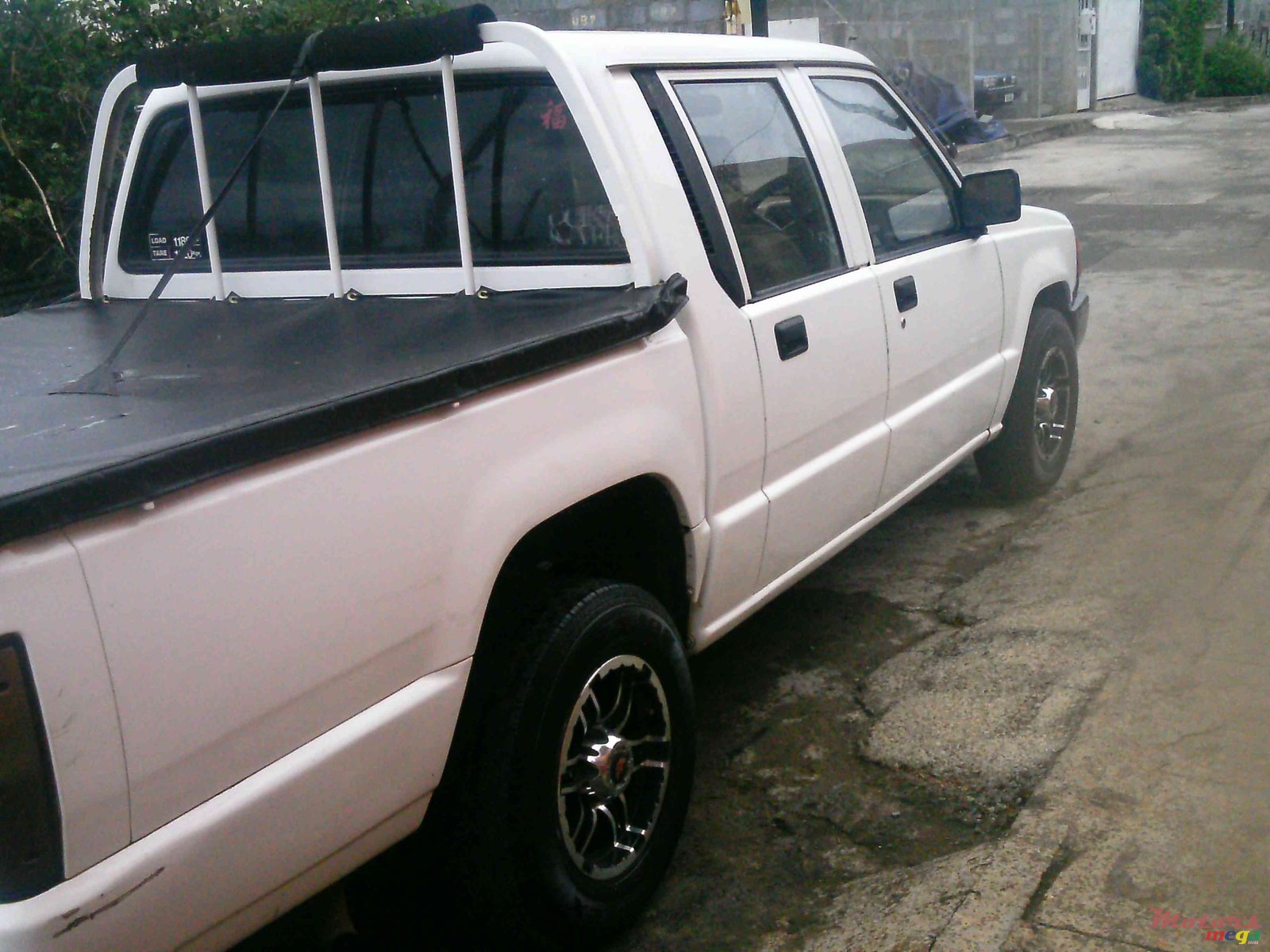 2000' Mitsubishi L 200 L200 pick up photo #1