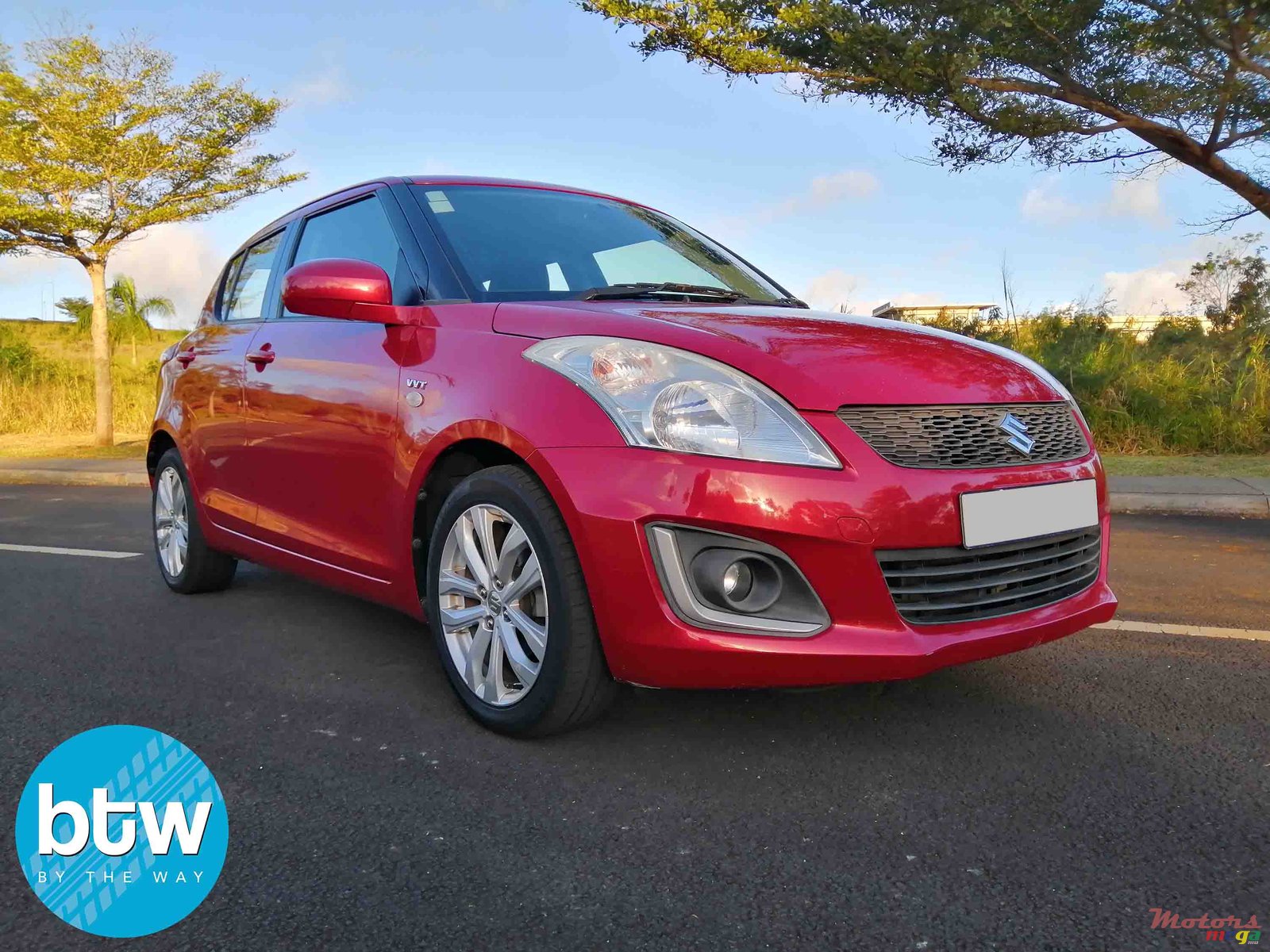 2015' Suzuki Swift photo #1