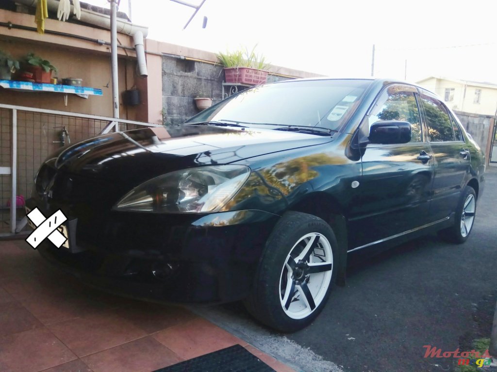 2003' Mitsubishi Lancer photo #3