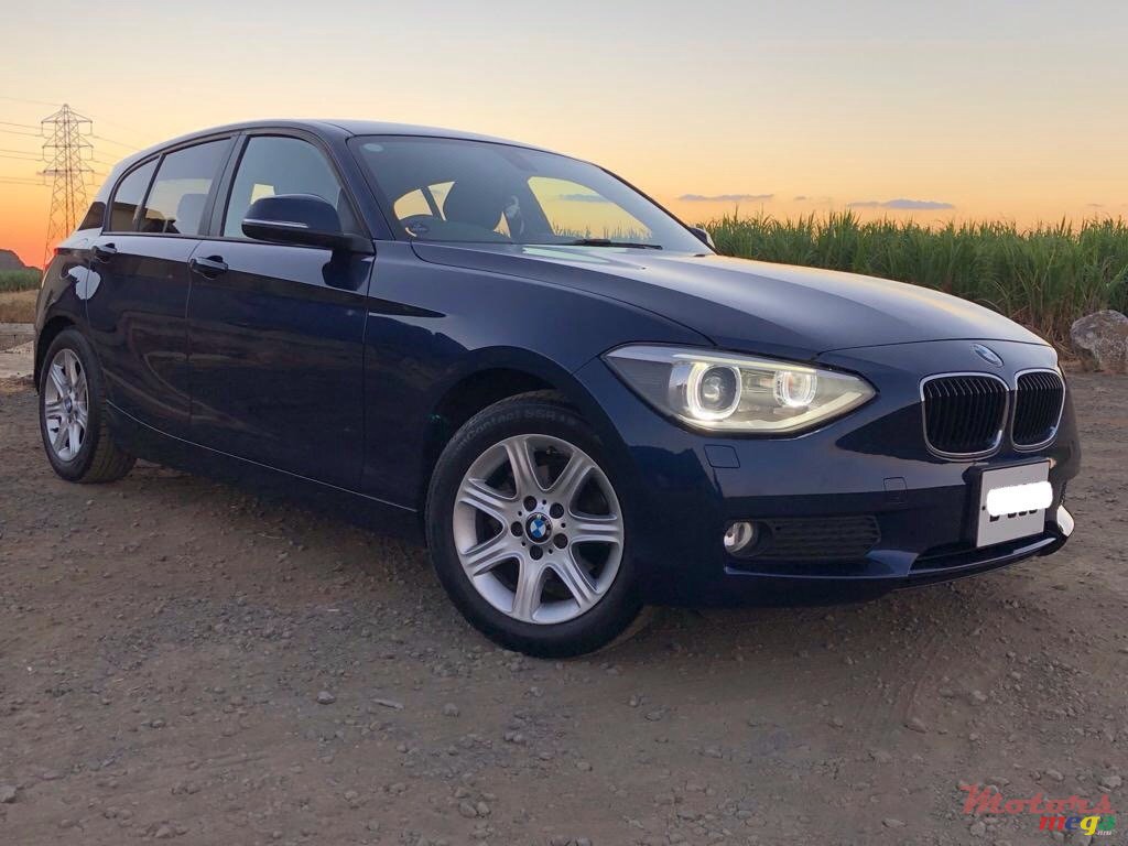 2011' BMW 116 photo #1