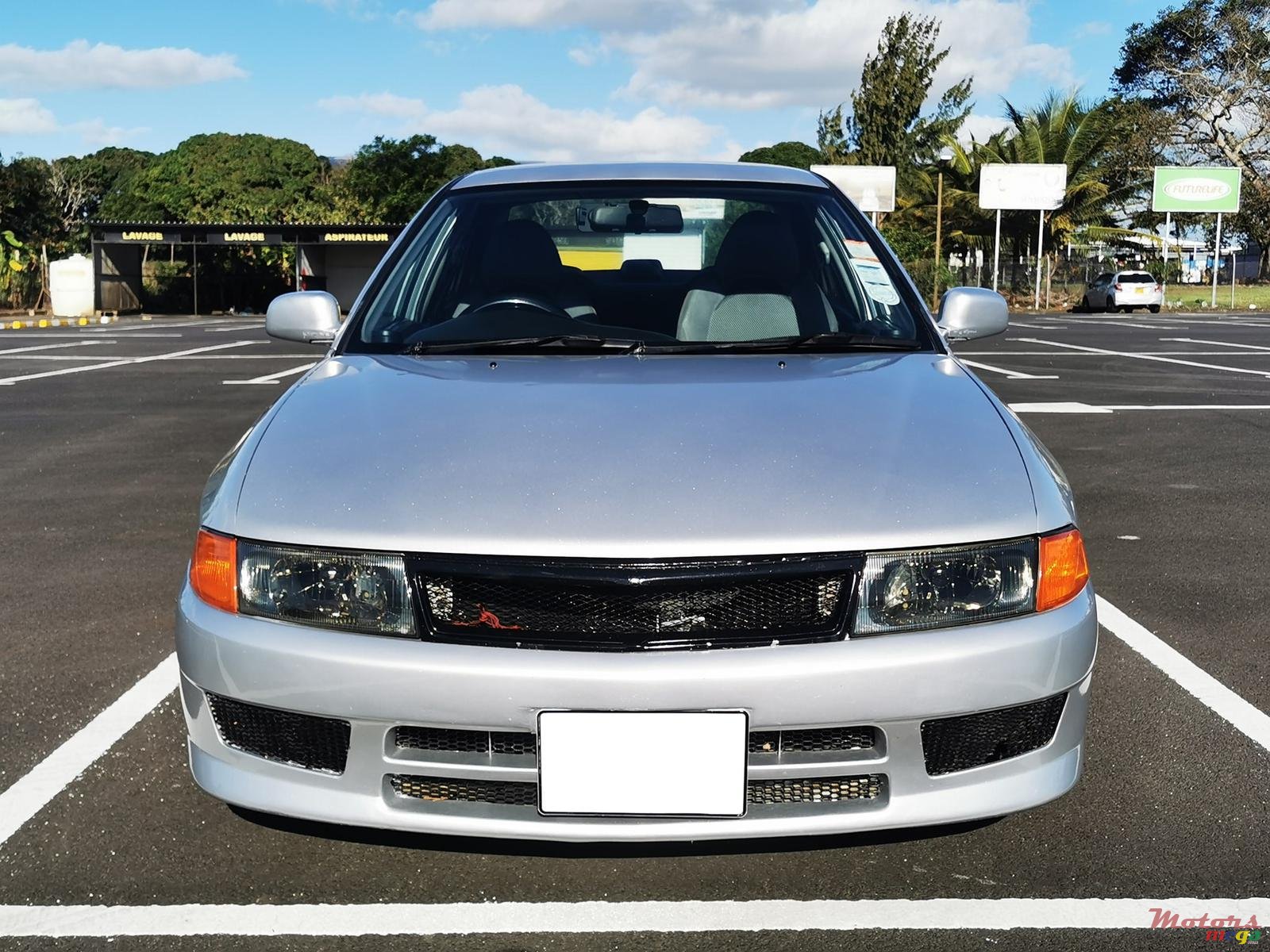 1999' Mitsubishi Lancer MX photo #1