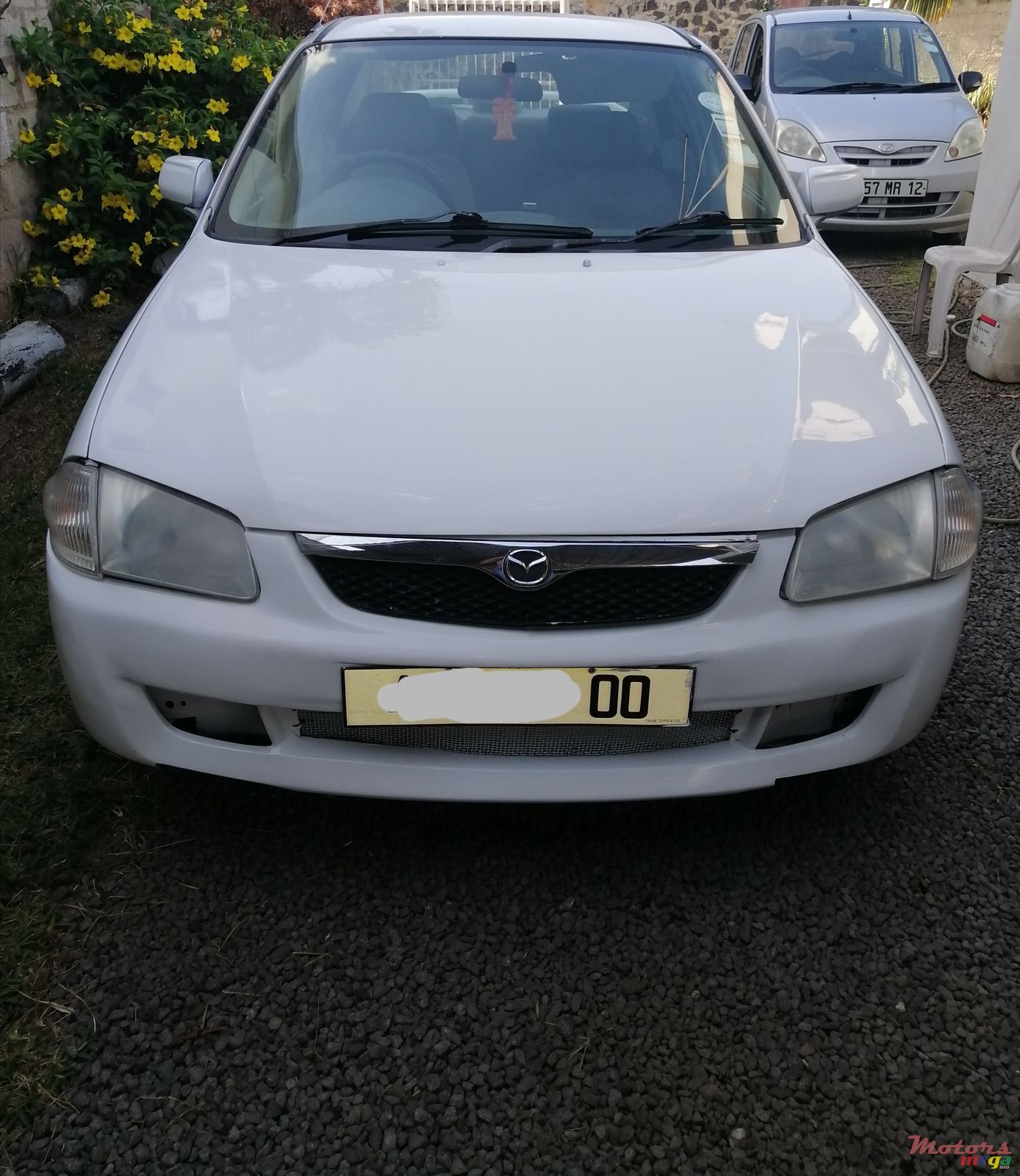 2000' Mazda 323 Familia photo #1