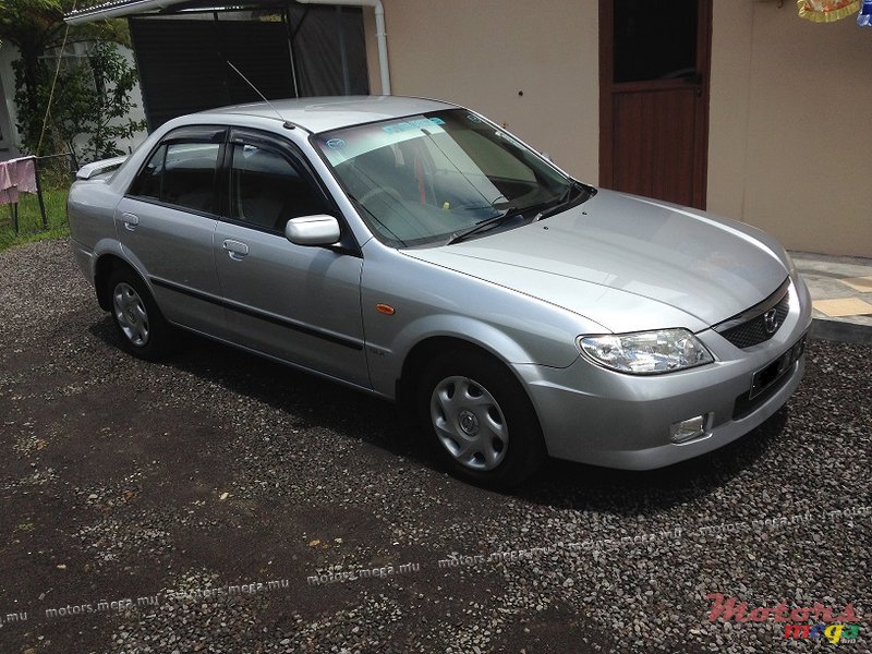 2004' Mazda 323 photo #1