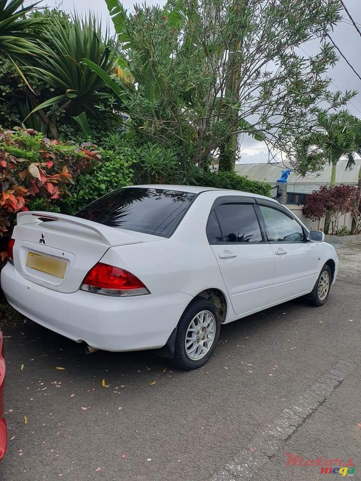 2004' Mitsubishi Lancer Glx photo #6