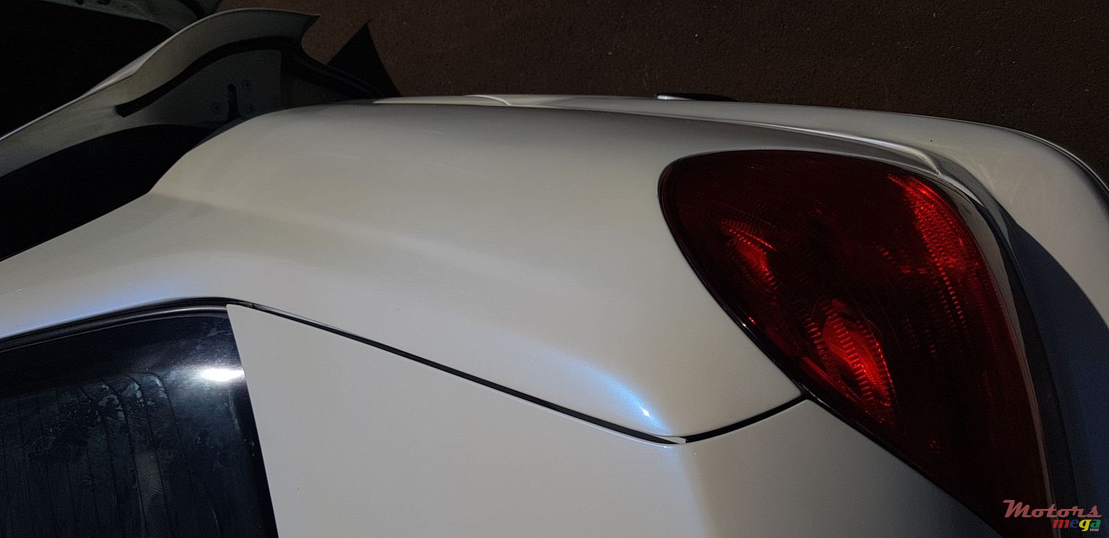 2004' Nissan Sunny photo #2