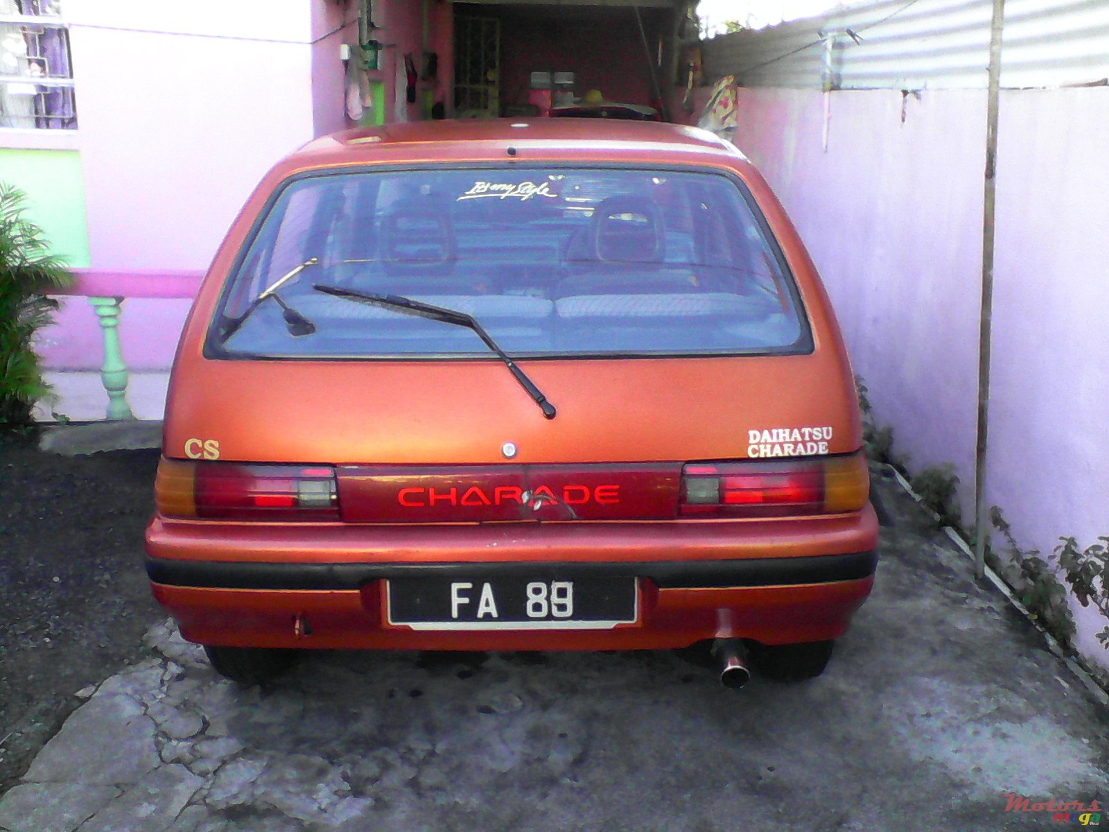 2012' Daihatsu Charade g100 photo #1