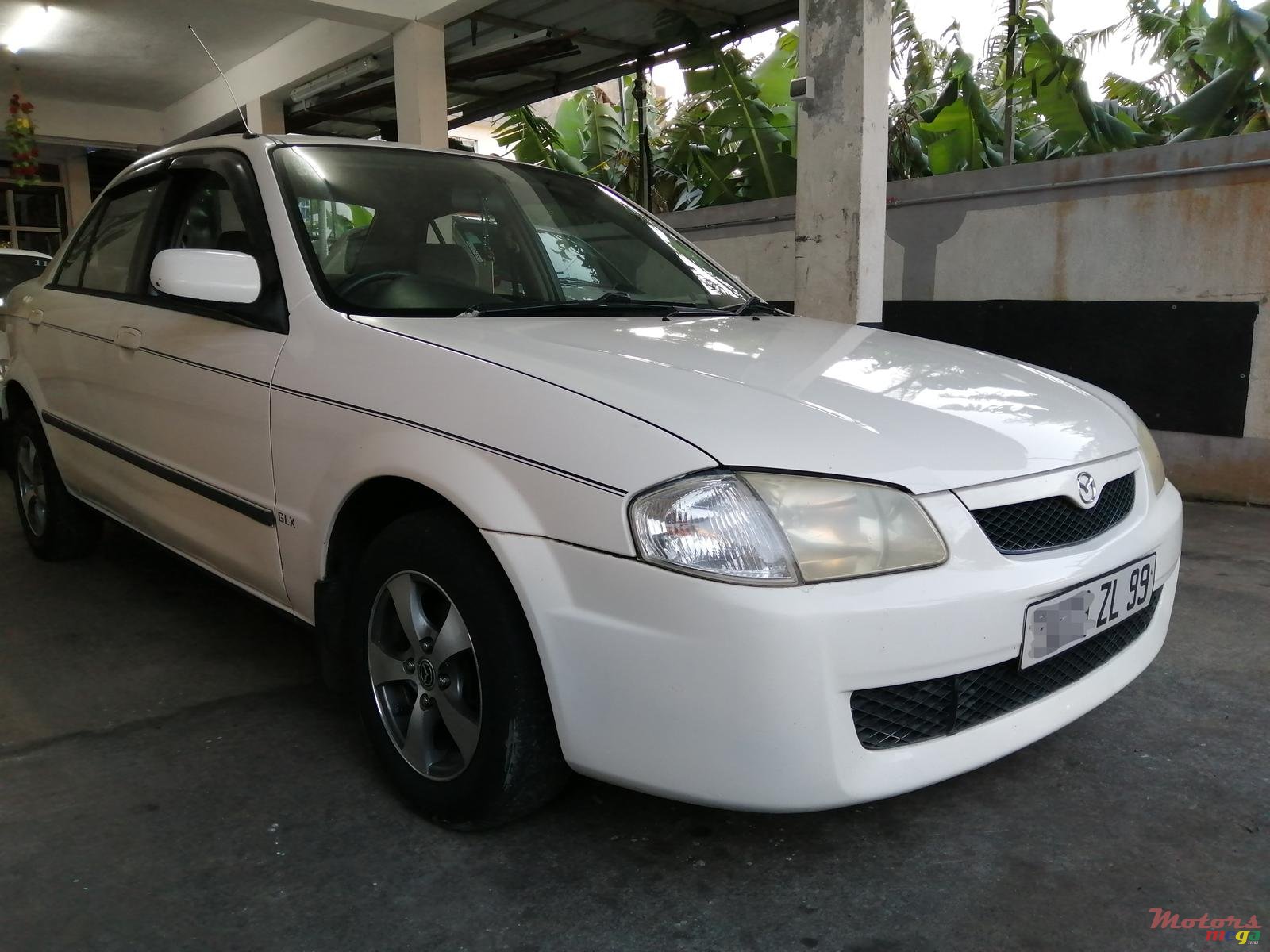 1999' Mazda 323 Famillia photo #1