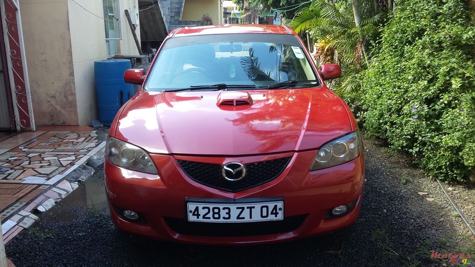 2004' Mazda 3 photo #1