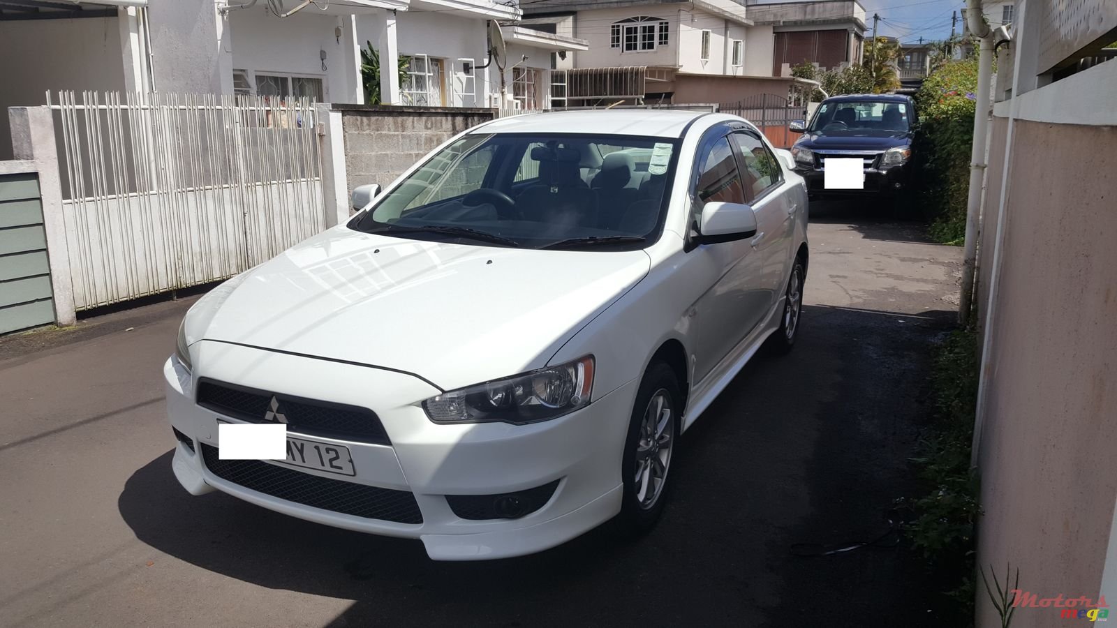 2012' Mitsubishi Lancer Ex photo #2