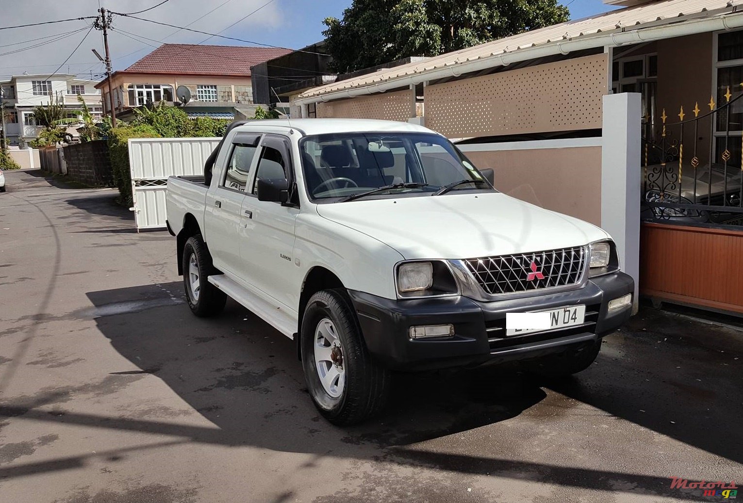 2004' Mitsubishi L 200 photo #1