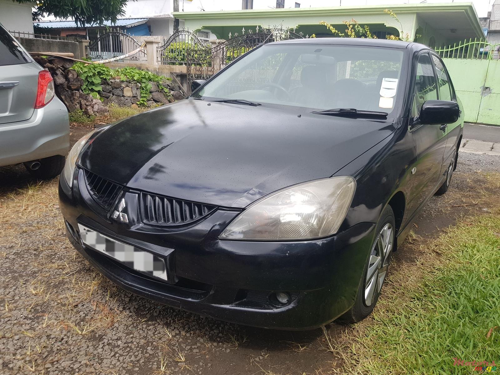 2004' Mitsubishi Lancer photo #1