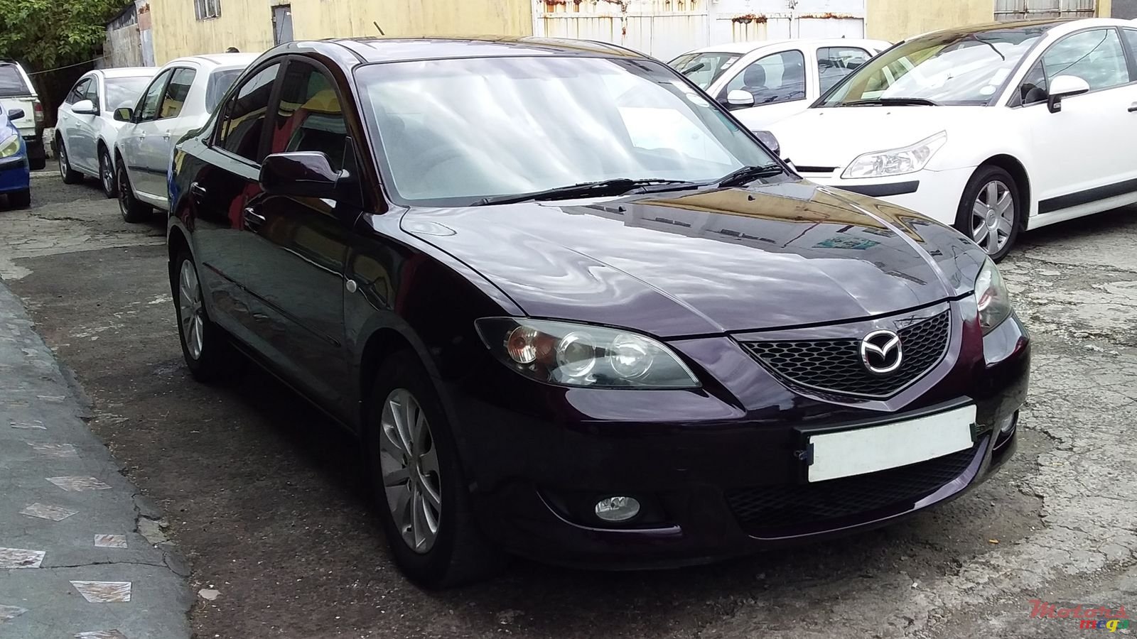 2006' Mazda 3 photo #1