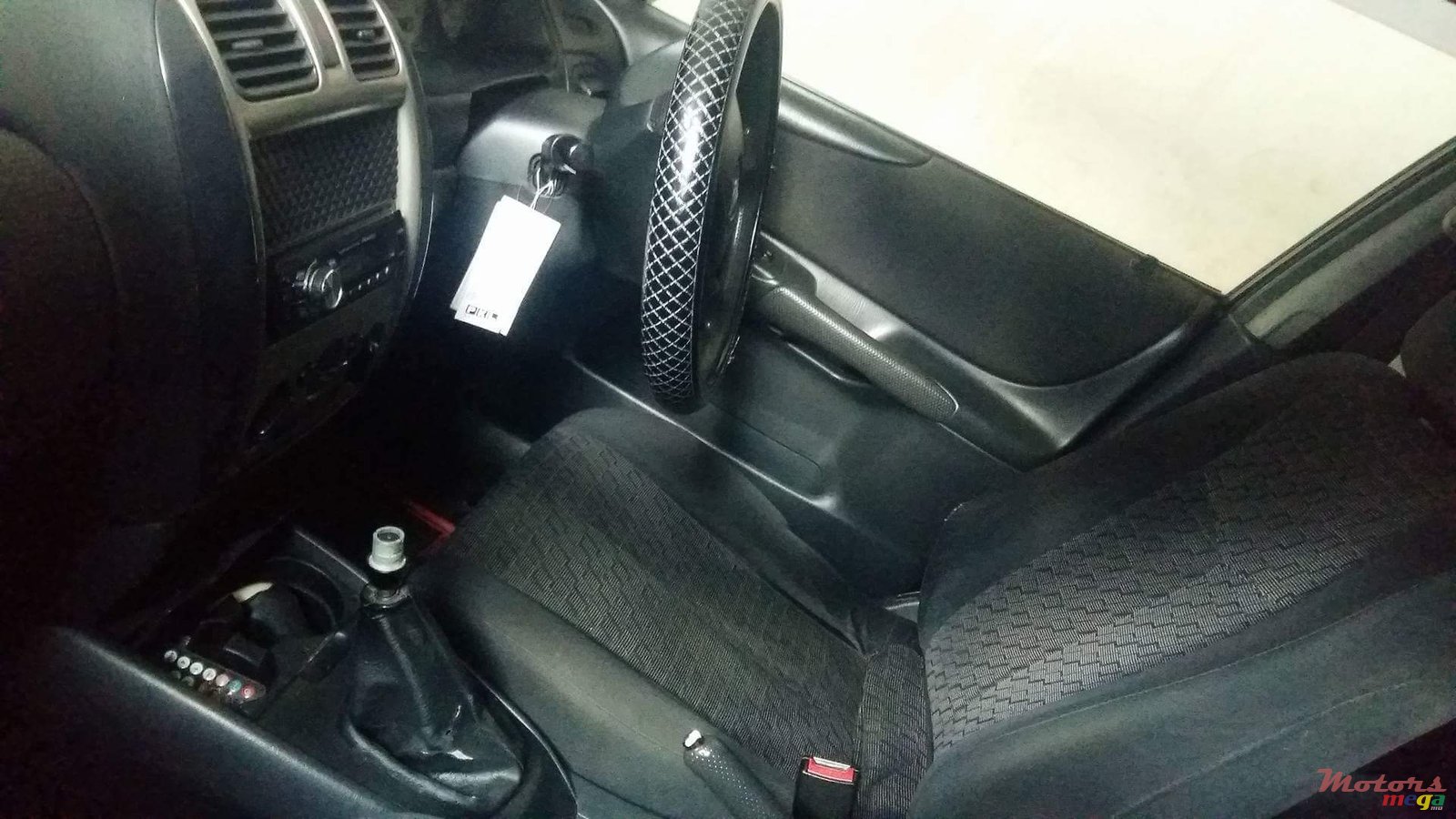 2001' Mazda 323 Hatch Back photo #6