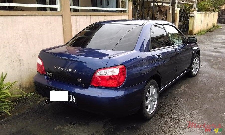 2004' Subaru Impreza 1.6 photo #2