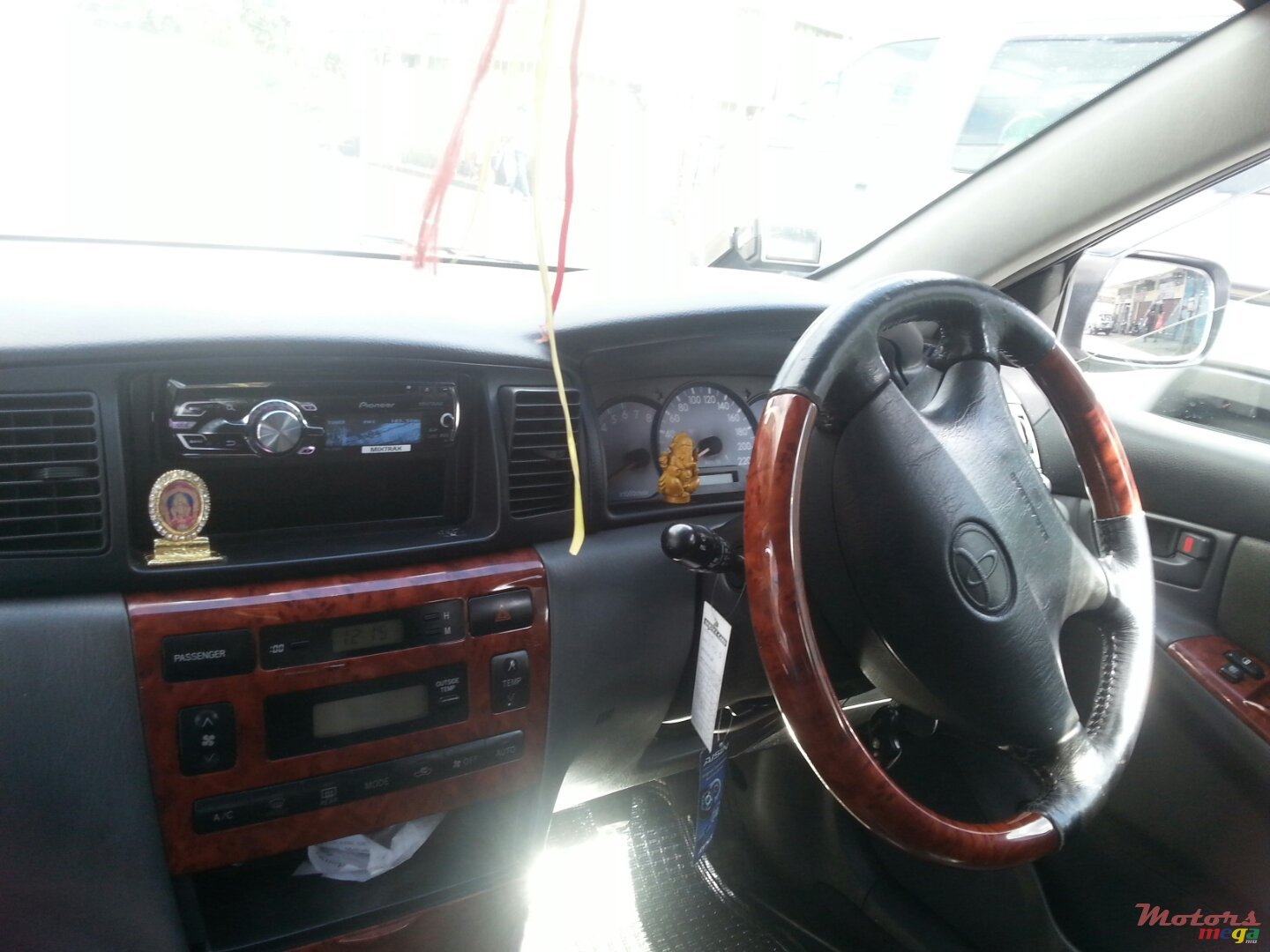 2003' Toyota Corolla NZE photo #3