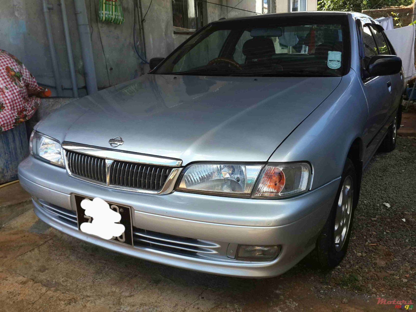 1999' Nissan Sunny photo #1