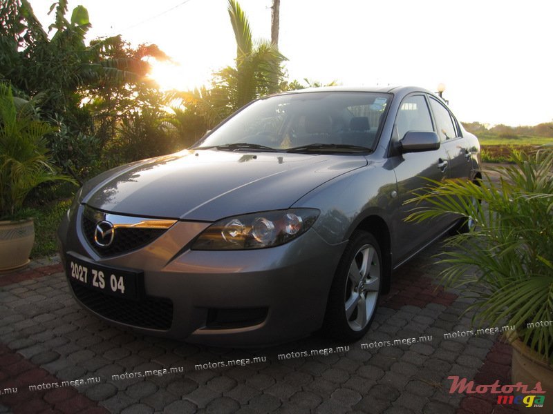 2004' Mazda Alloy wheels photo #3