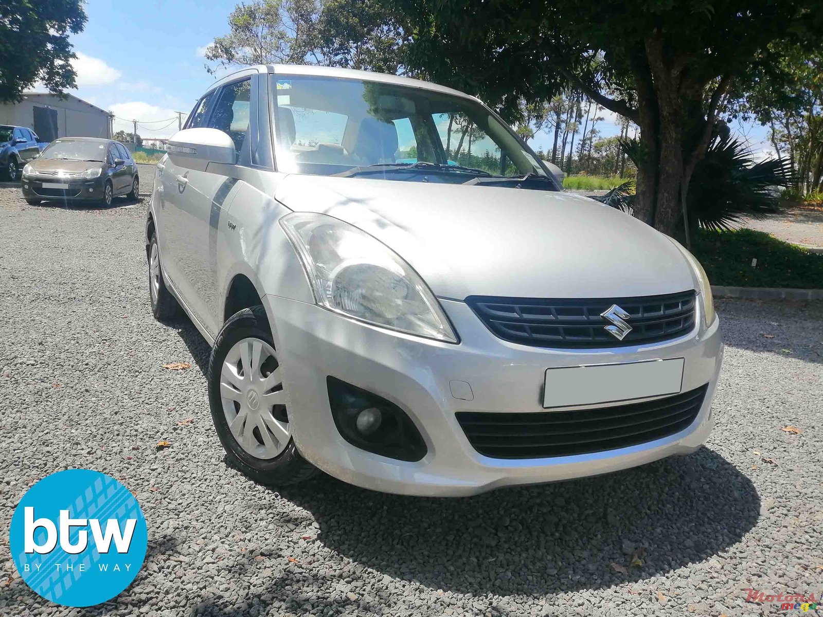 2014' Suzuki Swift Dzire photo #1